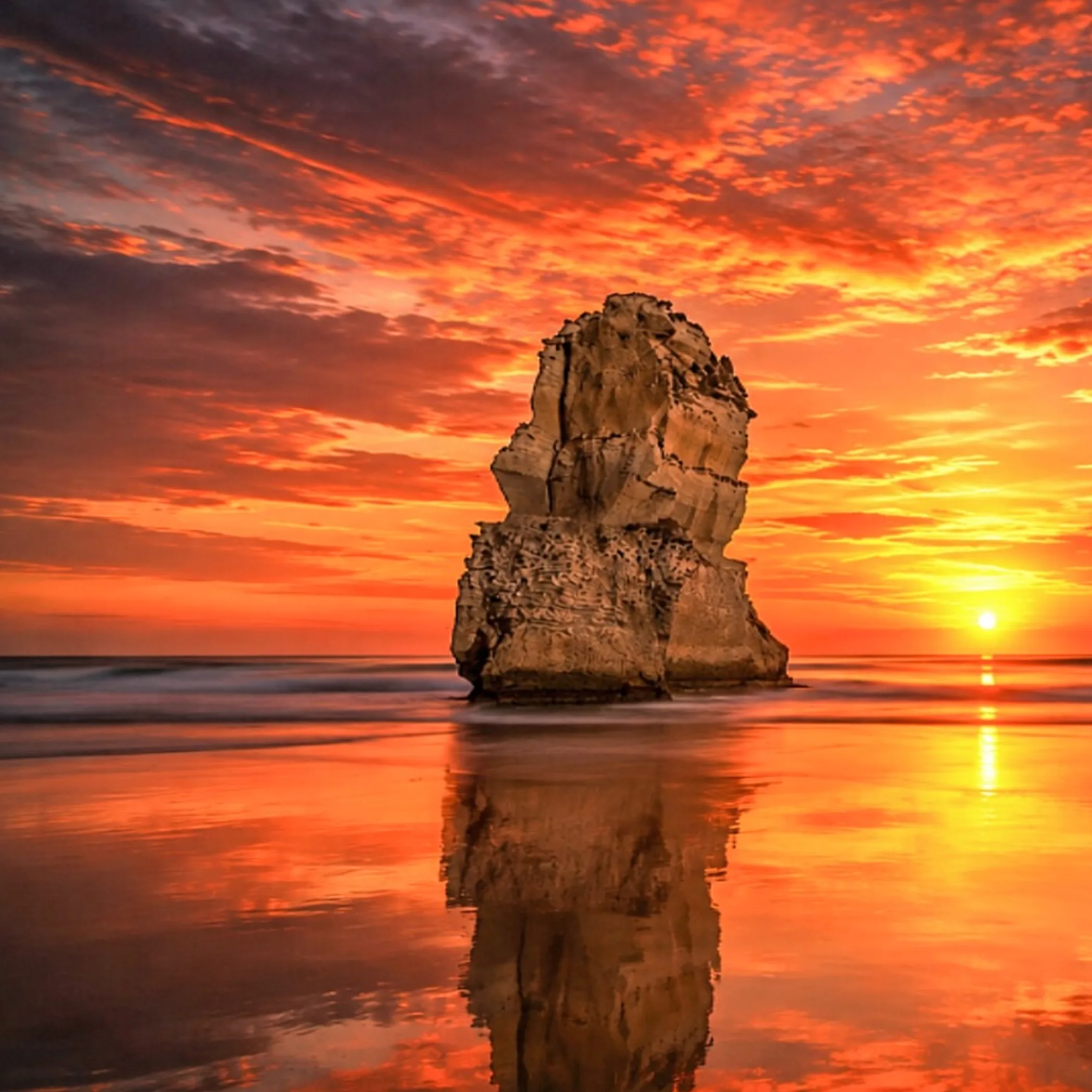 twelve apostles rock formation at sunset